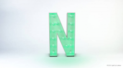 A large, illuminated letter "N" with a green glow against a plain background.